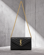 Ysaint Laurent Cassandre Envelope Negro Dorado