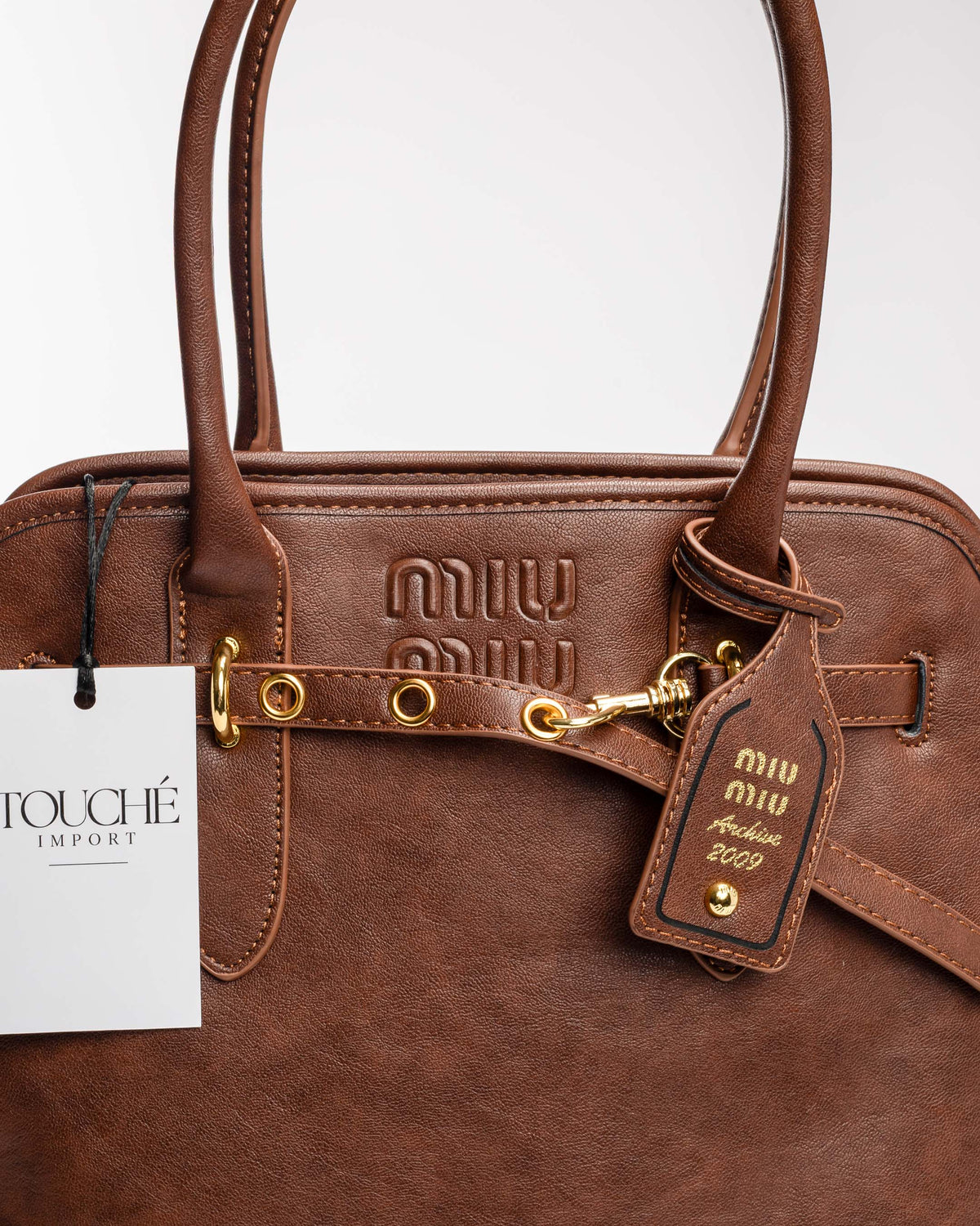 Miu Miu Aventure Marrón – foto 4
