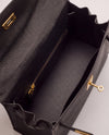Hermès Kelly Mini Blanco y Negro