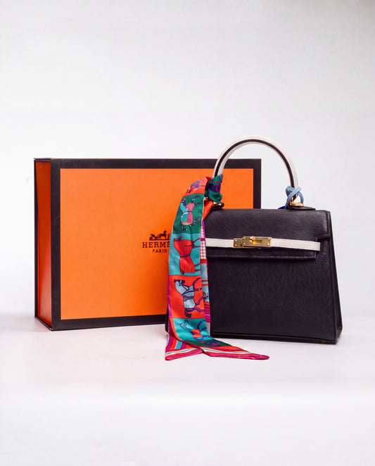 Hermès Kelly Mini Blanco y Negro